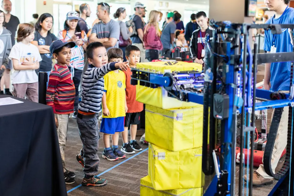 Children with a robot at the Bay Area Science Festival - San Francisco