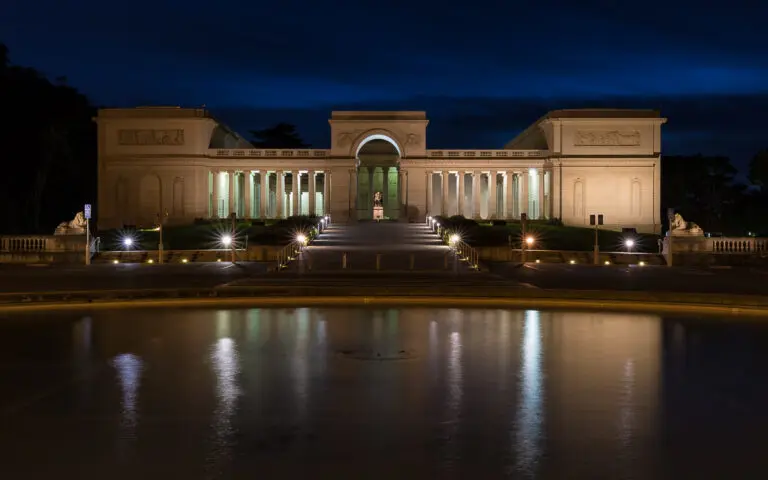 The Legion of Honor museum lit at night in Lincoln Park, the venue for Azzedine Alaia: Sculpting Fashion - San Francisco