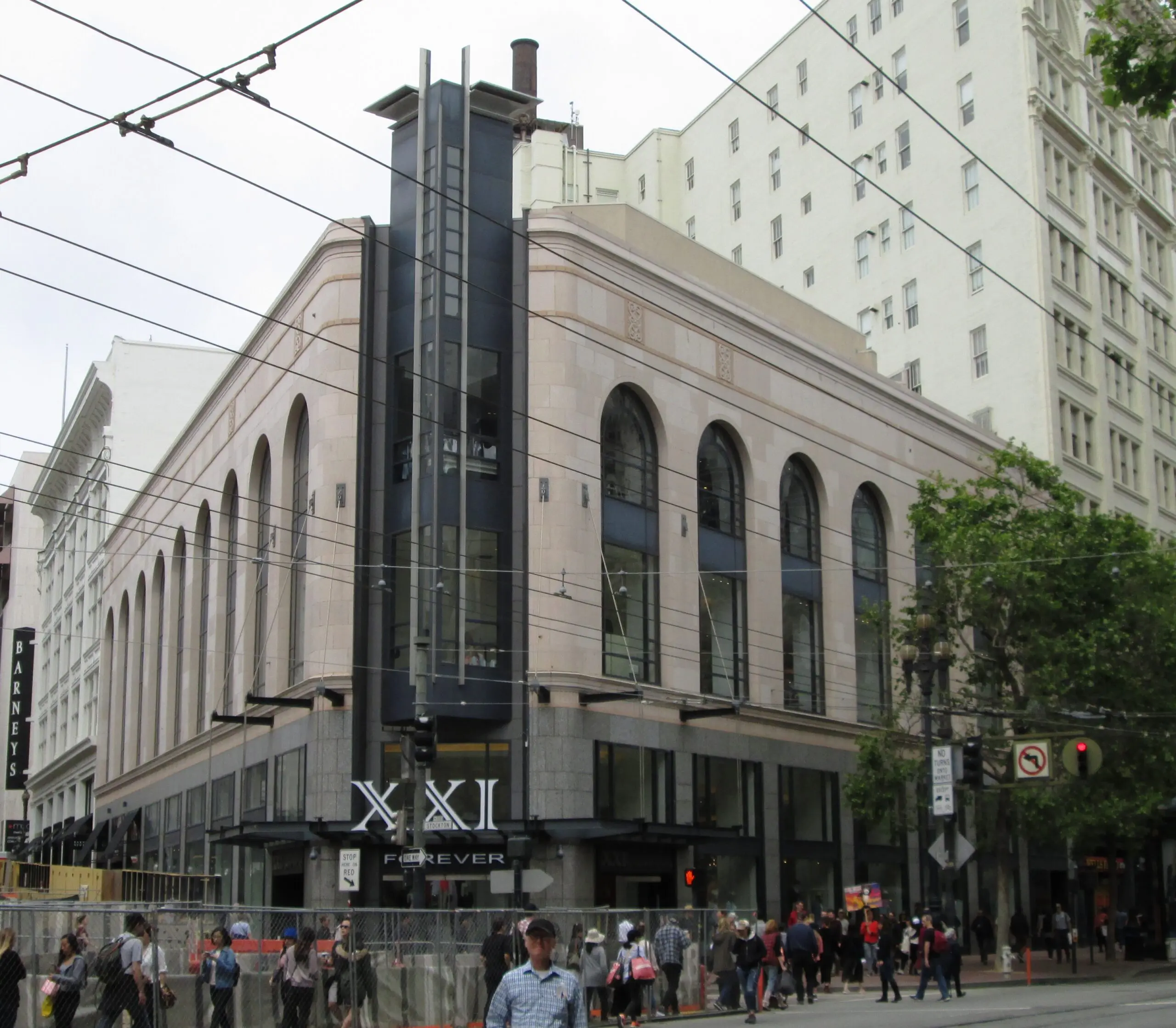 2 Stockton St., a four-story stone building with arched windows at Market and Stockton streets, future home of Nordstrom Rack - San Francisco