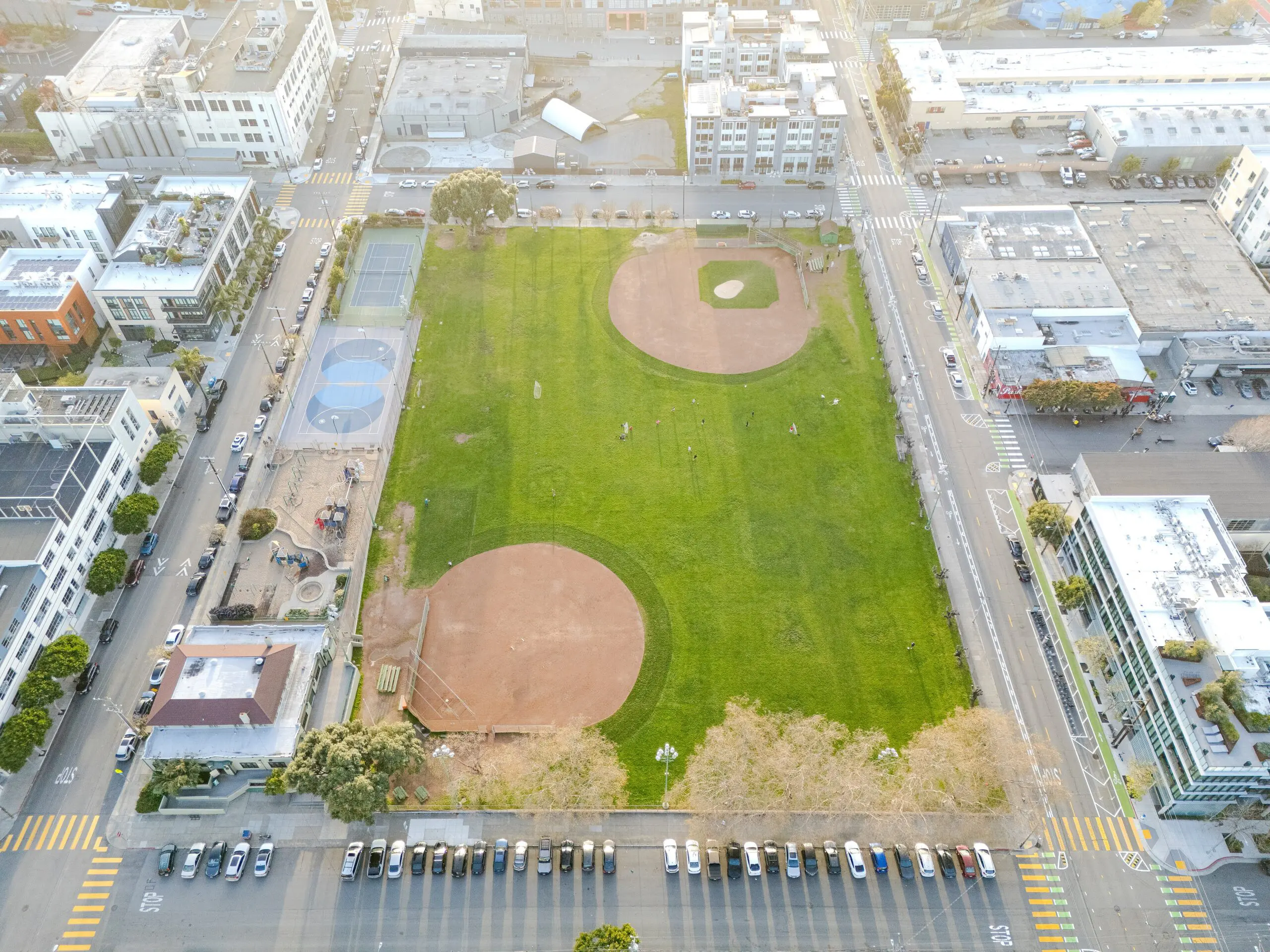 Aerial view of Jackson Playground on Potrero Hill, with two ballfields, a playground, an outdoor court and the clubhouse at 17th and Carolina streets - San Francisco