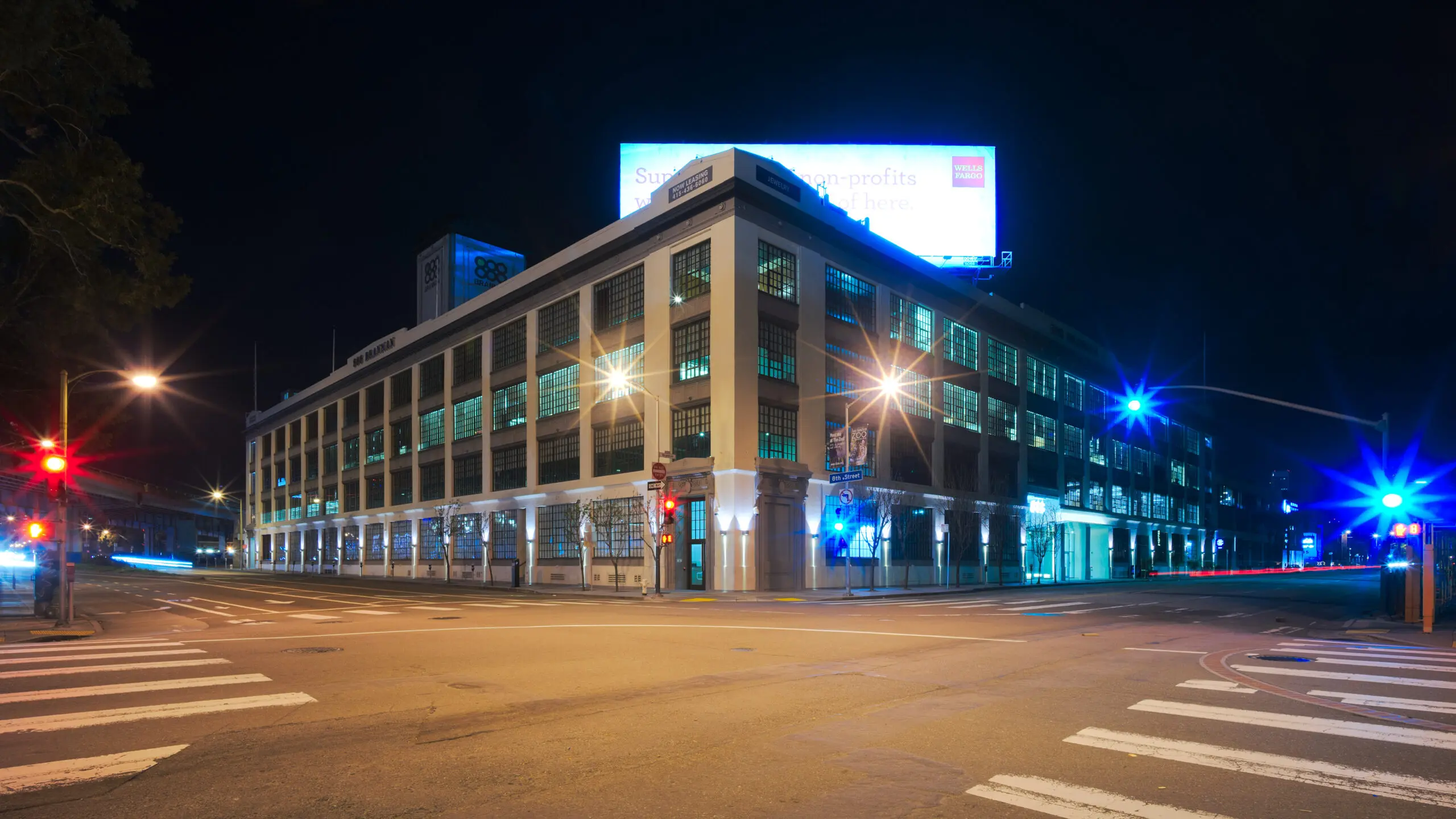 The office building at 888 Brannan Street in SoMa at night, where tech leasing is driving down office vacancy - San Francisco