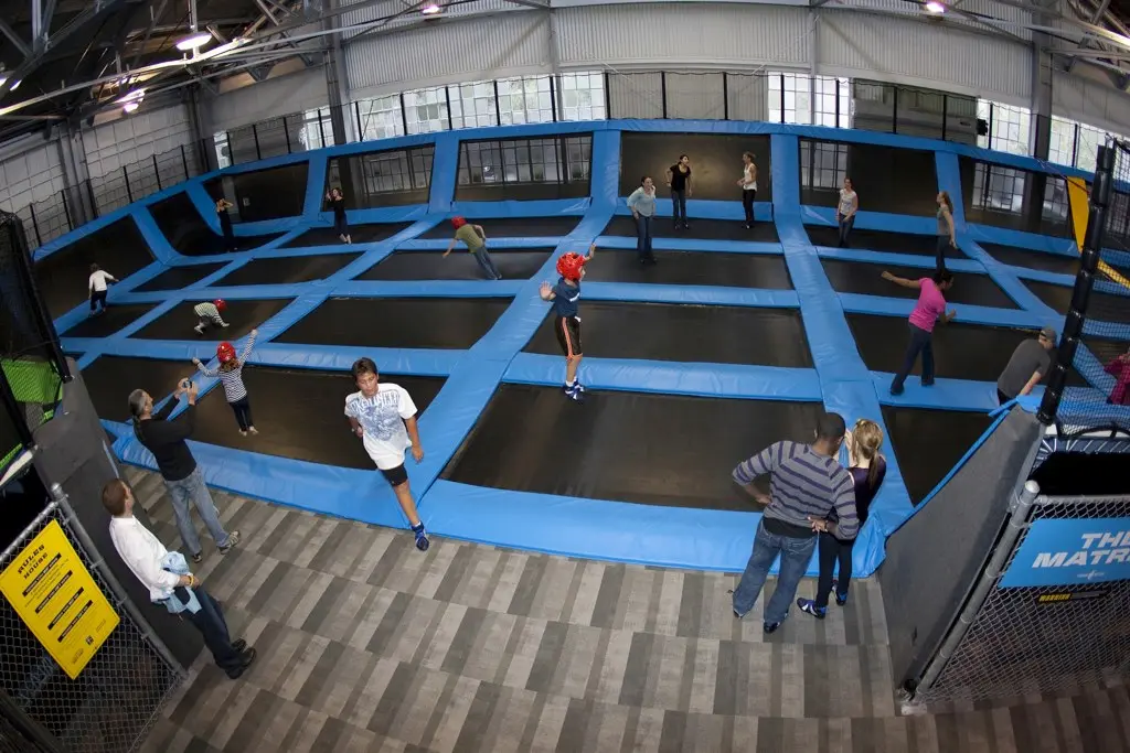 Jumpers on The Matrix, 42 connected trampolines inside House of Air at Crissy Field in the Presidio - San Francisco