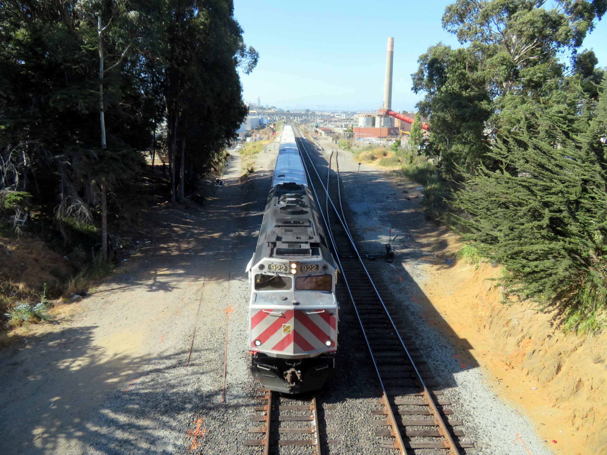 A Caltrain train passing the future Oakdale Avenue station site in the Bayview - San Francisco