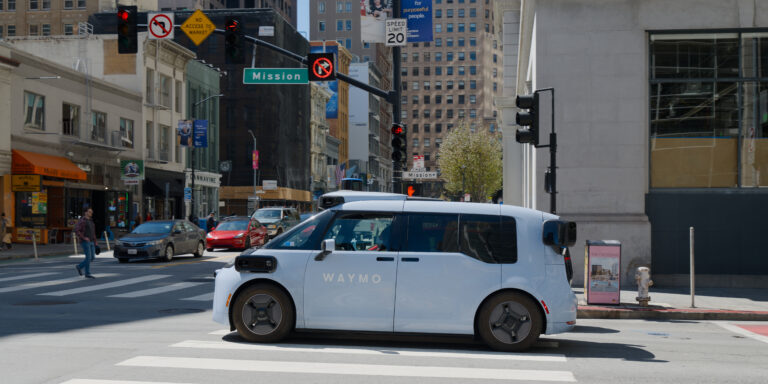 Waymo driverless robotaxi on Mission Street - San Francisco