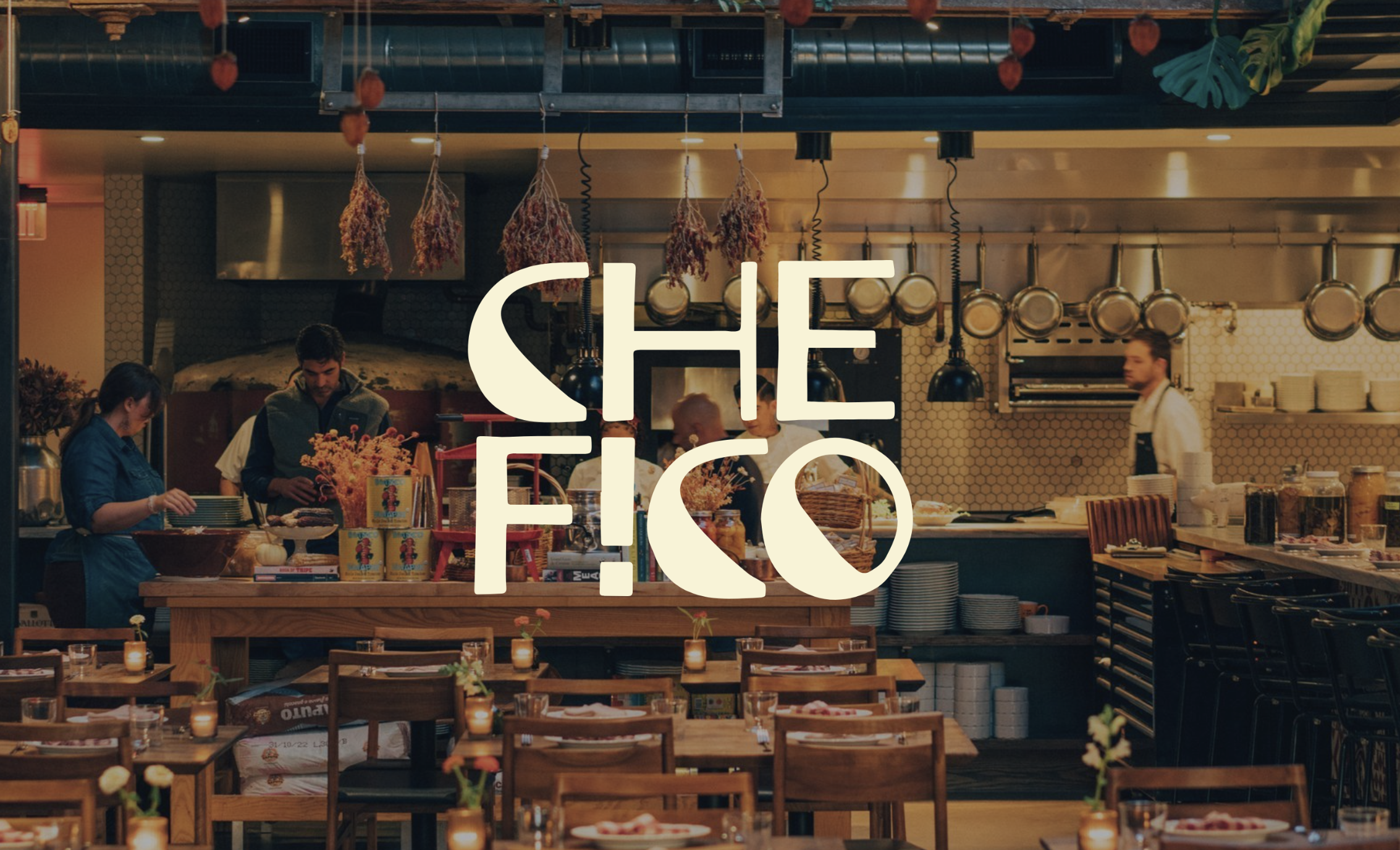 Che Fico dining room and open kitchen at 838 Divisadero Street with the restaurant logo, photo from Che Fico - San Francisco